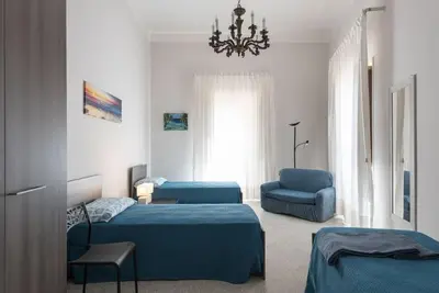Letto o letti in una camera di La casa di Artemide*****