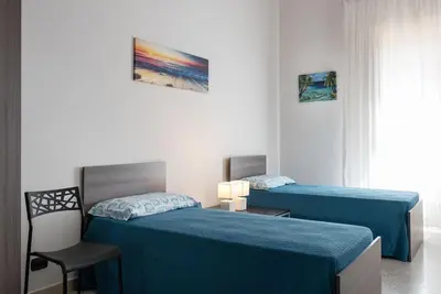 Letto o letti in una camera di La casa di Artemide*****