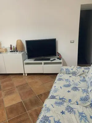 TV o dispositivi per l'intrattenimento presso La casa con il terrazzo,via arizzi Ortigia