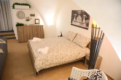 Letto o letti in una camera di Domus Ursino Comfort