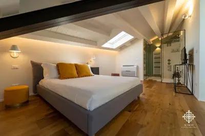 Letto o letti in una camera di Suite Elios Ortigia