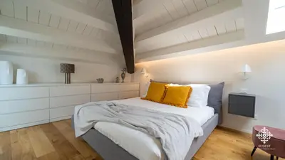 Letto o letti in una camera di Suite Elios Ortigia
