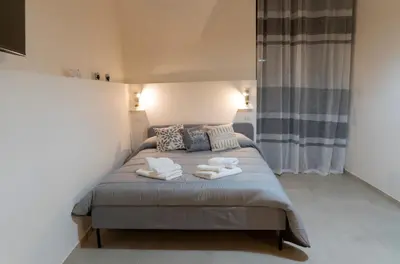 Letto o letti in una camera di AD UN PASSO DAL CENTRO