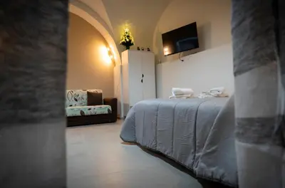 Letto o letti in una camera di AD UN PASSO DAL CENTRO