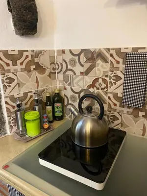 Cucina o angolo cottura di La Piccola Grotta Ursino