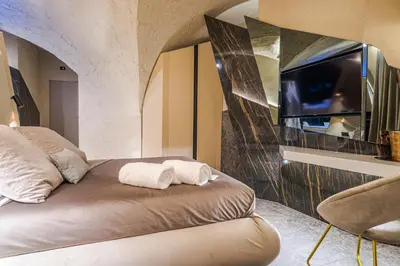 Letto o letti in una camera di Le Suites Del Duomo Luxury