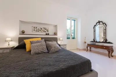 Letto o letti in una camera di Duomo Seaside Deluxe Apartment by Ortigia Apartments