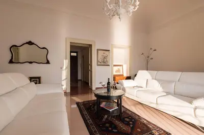 Area soggiorno di Duomo Seaside Deluxe Apartment by Ortigia Apartments