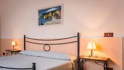 Letto o letti in una camera di Yellow-house 100 meters from the sandy beach