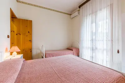 Letto o letti in una camera di Yellow-house 100 meters from the sandy beach
