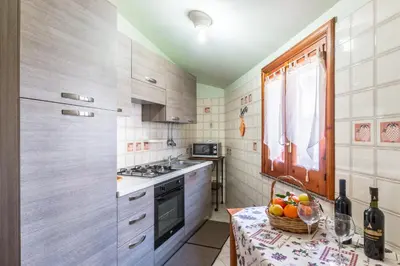 Cucina o angolo cottura di Yellow-house 100 meters from the sandy beach
