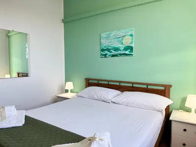 Letto o letti in una camera di Calauriia Apartments Marzamemi