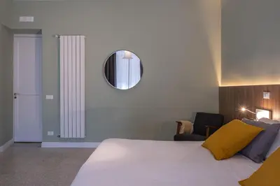 Letto o letti in una camera di Àita Domus