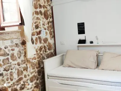 Letto o letti in una camera di Casa ARETUSKA