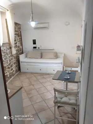 Letto o letti in una camera di Casa ARETUSKA