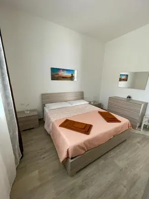 Letto o letti in una camera di Casa Marianelli