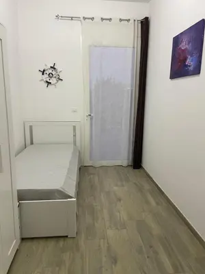 Letto o letti in una camera di Casa Marianelli