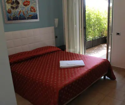 Letto o letti in una camera di Hotel Vittorio Emanuele