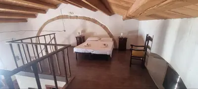 Letto o letti in una camera di Il Casale Apartament&Rooms