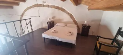 Letto o letti in una camera di Il Casale Apartament&Rooms