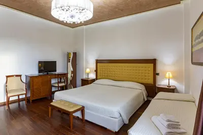 Letto o letti in una camera di Albatros Hotel