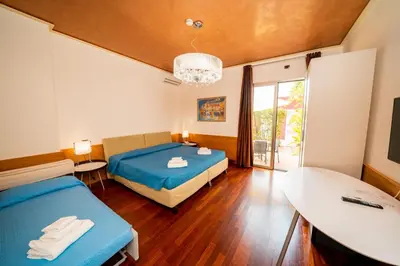 Letto o letti in una camera di Albatros Hotel