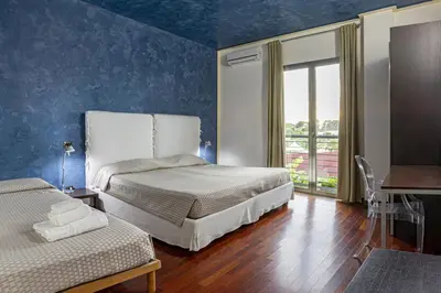 Letto o letti in una camera di Albatros Hotel