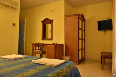 Letto o letti in una camera di Hotel Casa Mia