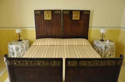 Letto o letti in una camera di Hotel Casa Mia