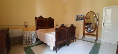 Letto o letti in una camera di Hotel Casa Mia