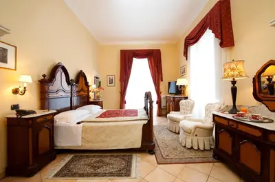 Letto o letti in una camera di Charme Hotel Villa Principe Fitalia