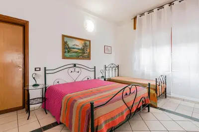 Letto o letti in una camera di Terre di mare near the sandy beach with pool, parking & wifi