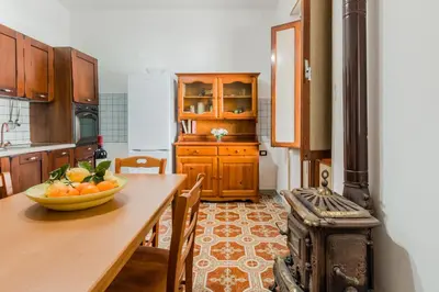 Cucina o angolo cottura di Terre di mare near the sandy beach with pool, parking & wifi