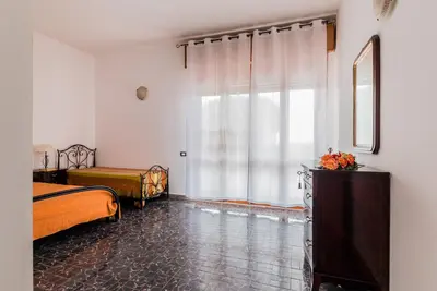 Letto o letti in una camera di Terre di mare near the sandy beach with pool, parking & wifi