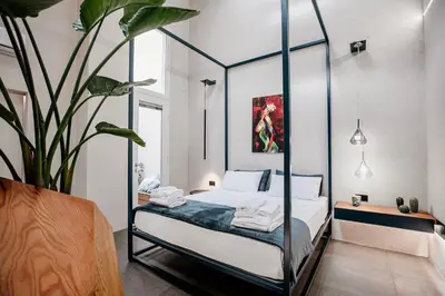 Letto o letti in una camera di FICOPALA SUITES