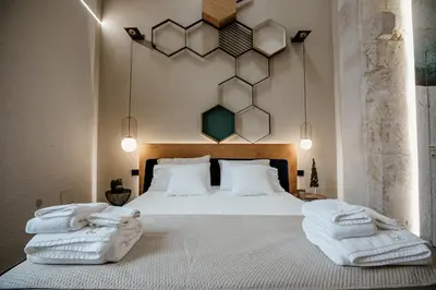 Letto o letti in una camera di FICOPALA SUITES