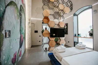 Letto o letti in una camera di FICOPALA SUITES