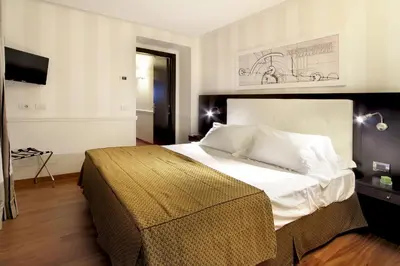 Letto o letti in una camera di Il Principe Hotel Catania