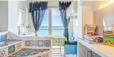 Cucina o angolo cottura di casa Porta Spagnola