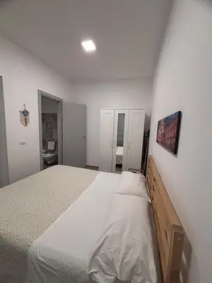 Letto o letti in una camera di Case RO MA - Maria
