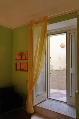 Letto o letti in una camera di La Nicchia