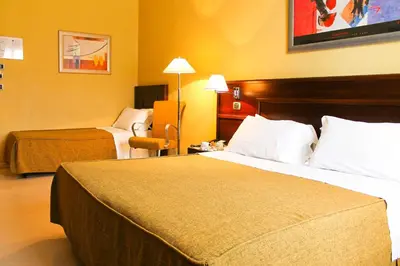 Letto o letti in una camera di Panorama Hotel