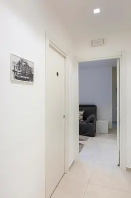 Area soggiorno di Syraka Camere