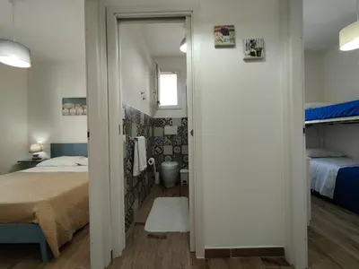 Letto o letti in una camera di L’isola di Cristiano Marzamemi