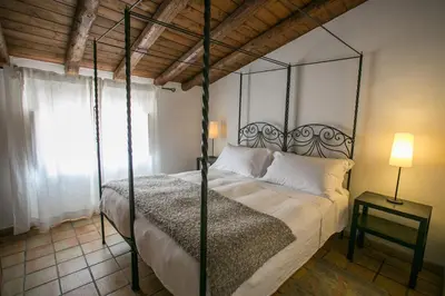 Letto o letti in una camera di Alla Giudecca