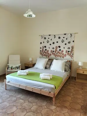 Letto o letti in una camera di Casa Valvo Lido di Noto