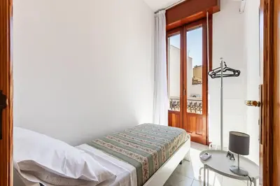 Letto o letti in una camera di Paco House
