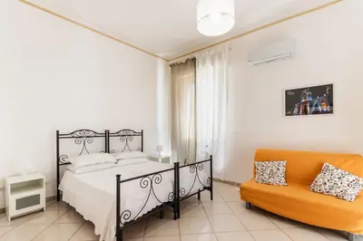 Letto o letti in una camera di Paco House