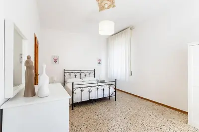 Letto o letti in una camera di Paco House
