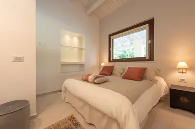 Letto o letti in una camera di Villa Angelina - IsulaTravel